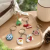Six Christmas-themed keychains, Christmas trees, Christmas hats, candy canes, snowflakes, Christmas stockings, and Santa Claus avatars details Picture